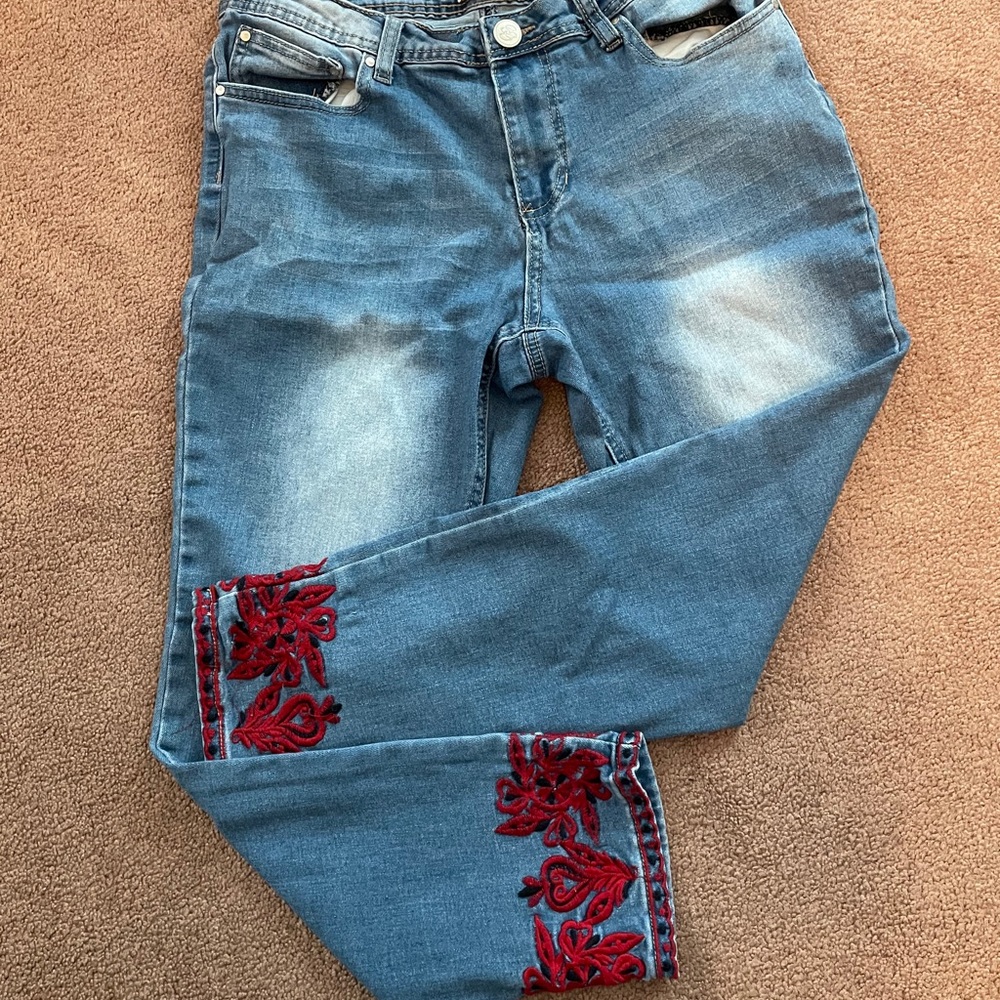 Eighty eight size 11 stretchy jeans with red